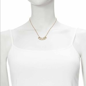 Vince Camuto Baguette Curved Bar Pendant